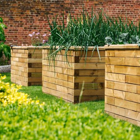 Idées de jardinières hautes pour mettre votre jardin en valeur